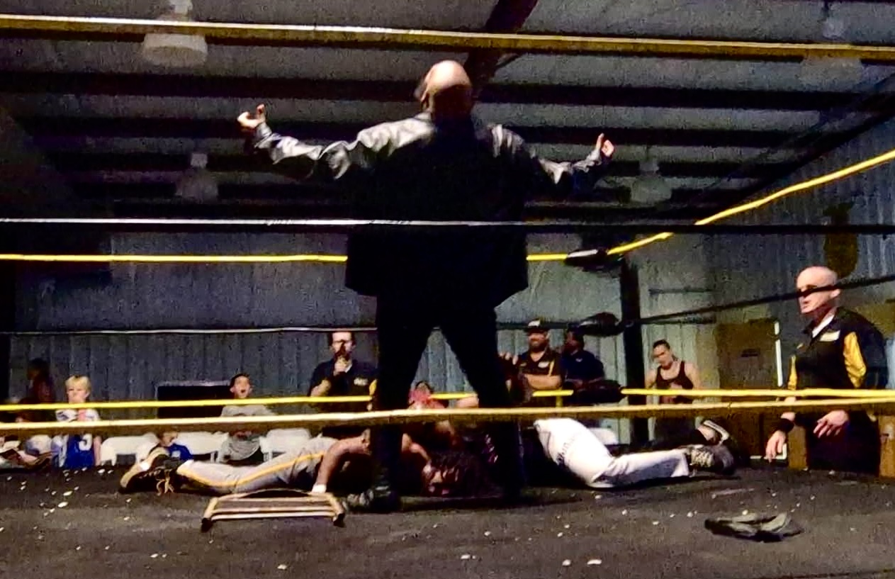 Azael Saddiq stands over the fallen champions